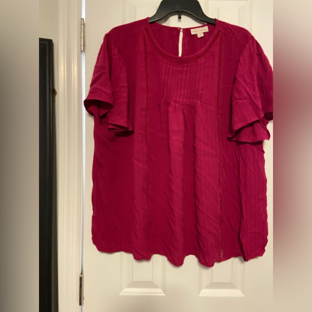 Pink short sleeve blouse light weight.